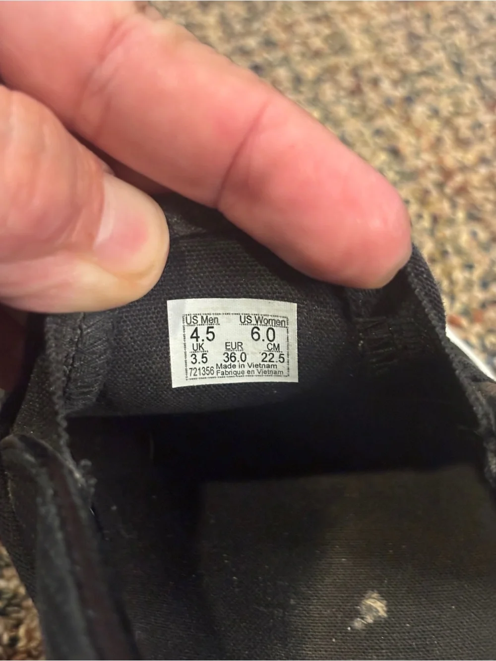Vans Black Perforated Slip-On Sneakers with White Sole